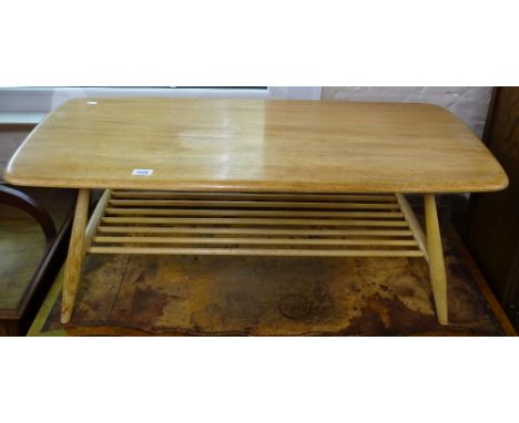 An Ercol 459 blonde 2-tier coffee table, L104cm, H37cm 