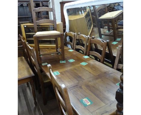 A good quality oak rectangular draw leaf dining table, with 2 spare leaves, L180cm extending to 260cm, W84cm, H76cm, together