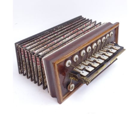 A 19th century French rosewood flutina, by Busson Brevete of Paris, satinwood inlaid border with brass mounts and mother-of-p