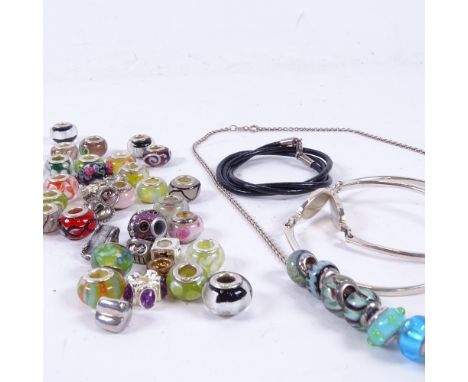 A collection of coloured silver mounted charms, 2 silver and mother-of-pearl bangles etc 
