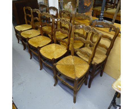 10 French carved oak ladder-back rush-seated dining chairs 