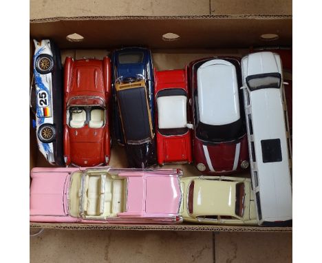 A box of diecast vehicles, including Burago and Maisto 