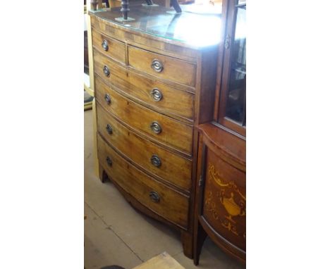 A large 19th century mahogany bow-front chest of 2 short and 4 long drawers, on bracket feet, W112cm, H128cm 