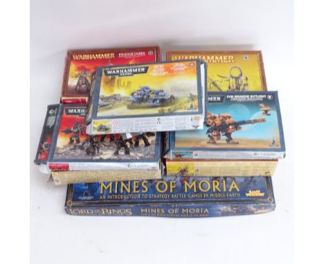 Various Games Workshop plastic assembly model toys, including Warhammer 40,000, and The Lord of The Rings Mines of Moria 