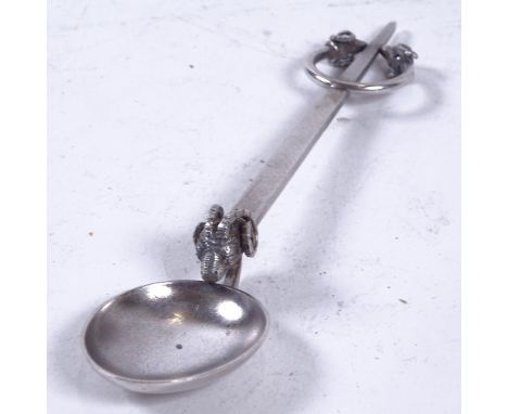 A Danish Art Nouveau silver sauce ladle, and an unmarked white metal Viking Revival spoon, largest length 14cm (2) 