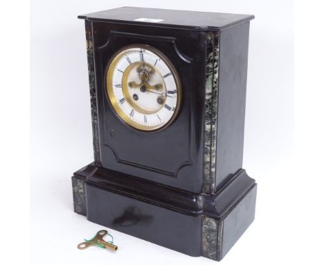 A large early 20th century slate and green veined marble 8-day mantel clock, white enamel dial with Roman numeral hour marker