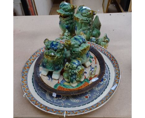 A Chinese ceramic charger with painted enamel decoration, diameter 38cm, a Chinese crackle glazed plate, and a group of potte