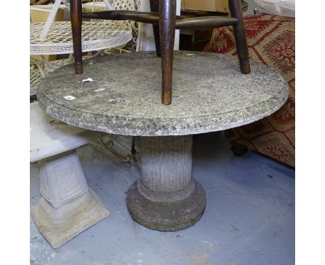 A weathered concrete circular garden table on pedestal stand, W90cm, H64cm 