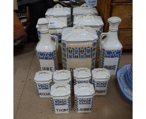 A set of 1930s French ceramic kitchen storage jars, and matching oil and vinegar bottles, height 22.5cm 