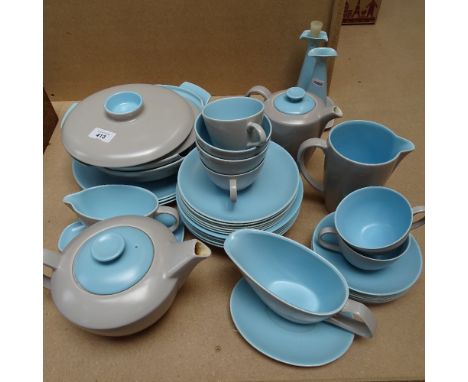 1960s Poole Pottery Twintone dinnerware and matching teaware, including a teapot and hot water jug 