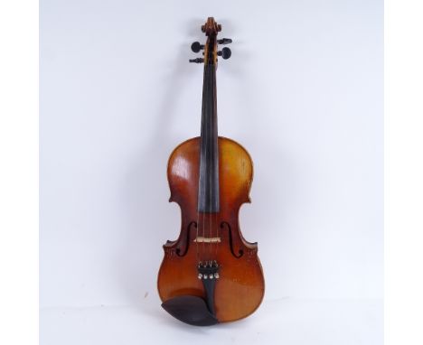 An early/mid-20th century Stradivarius copy violin and bow, in hardshell case, violin length 60cm 