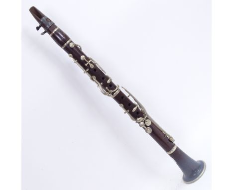 A Vintage rosewood 4-section clarinet, unmarked, overall length 57cm 