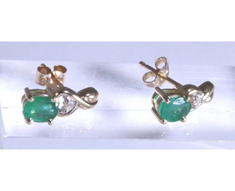 10 K gold emerald and diamond stud earrings, RRP £400