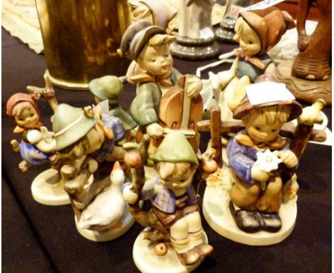 9 various Hummel figures    CONDITION REPORT:  At lotting all the pieces appear to be undamaged with no apparent restoration 