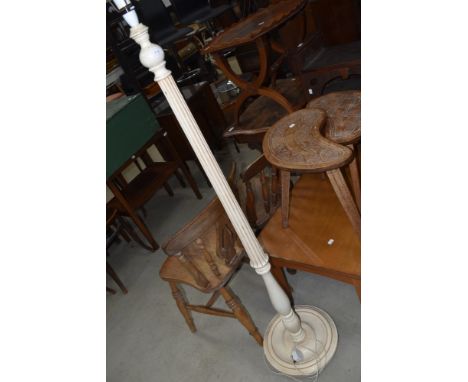 A vintage standard lamp in cream