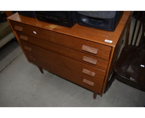 A vintage Golden oak bedroom chest of four graduated drawers, labelled Gomme, G plan