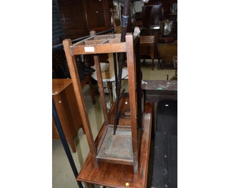 An early 20th Century stick stand and cane