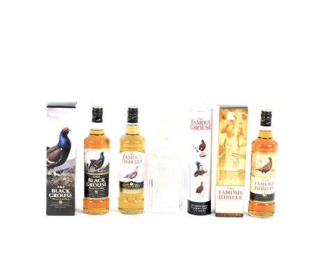 Assorted bottles of whisky and a glass decanter and stoppers. Comprising: a bottle of The Famous Jubilee and The Black Grouse