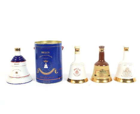 Four Wade decanters of Bells Scotch Whisky. Including commemorative examples. Comprising: an example to commemorate the birth