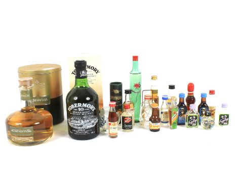 An assortment of whisky, champagne and assorted alcohol. Comprising: a bottle of Tobermory 10 year old single malt Scotch whi
