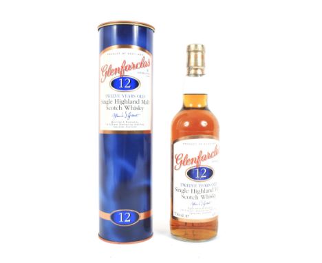 A bottle of Glenfarclas 12 years old Single Highland malt Scotch whisky in tin. 43% Vol., 700ml