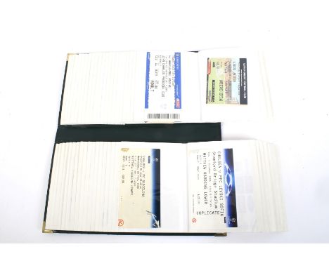 An album of approximately 100 football tickets. Including: Chelsea, Arsenal, Manchester United, Tottenham, with FA Cup Finals