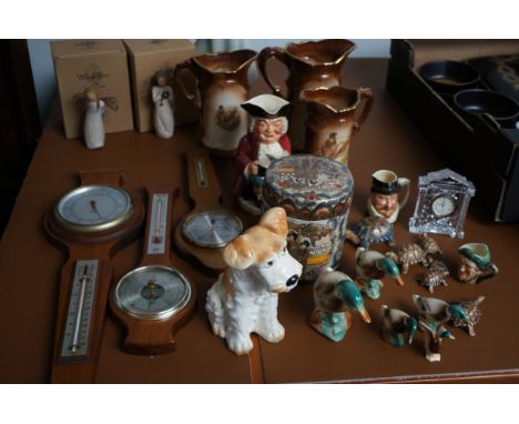 Collection of ceramic to include a Waterford clock, Sylvac dog, barometers & others 