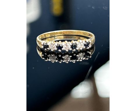9ct Gold ring set with sapphire & white stone Size M 