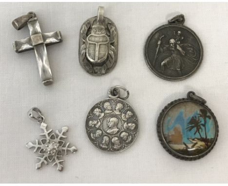  To include: an Egyptian scarab, a silk painted panel behind glass depicting palm trees and a medallion depicting Queen Victo