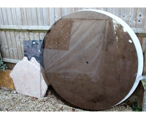 A LARGE ROUND MARBLE TABLE TOP  129cm in diameter approximately and another smoked glass table top 134cm and five pieces of d