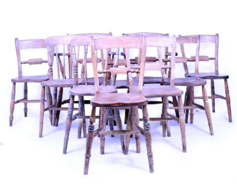 A MATCHED SET OF EIGHT 19TH CENTURY LIGHT ELM OXFORD PATTERN KITCHEN CHAIRS  (two carvers) together with two further spindle 