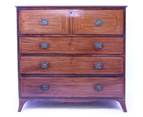 A 19TH CENTURY MAHOGANY SECRETAIRE CHEST the secretaire drawer opening to reveal pigeon holes and short drawers above three l