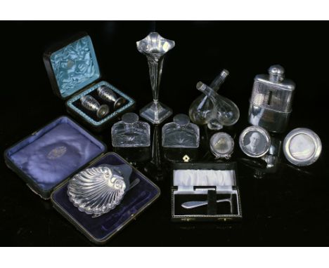 A QUANTITY OF SILVER to include a silver hip flask, silver topped bottles, a posy vase, picture frames etc