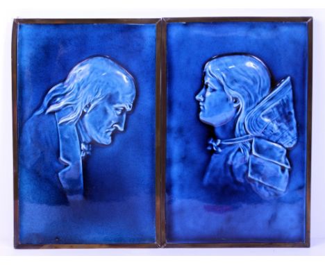TWO WEDGWOOD BLUE GLAZED PORTRAIT PLAQUES OR TILES in gilt metal frames, c.1860, 20cm x 31cm approximately 