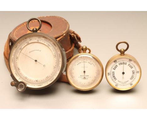 A LATE VICTORIAN POCKET ANEROID BAROMETER, the white enamelled dial inscribed Negretti & Zambra, London, in brass case, 1 3/4