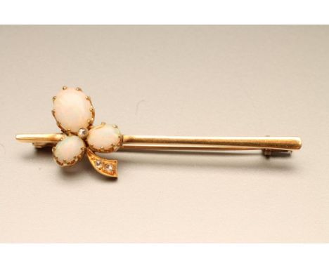 AN OPAL AND DIAMOND BROOCH, the three oval cabochon polished opals claw set as a leaf with three rose cut small diamonds on a