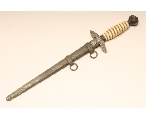 A THIRD REICH LUFTWAFFE OFFICER'S DAGGER, with 10" blade inscribed "fur langjahrige true Dienste der Generalstab" (sic), with