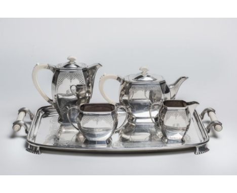 A SILVER FIVE PIECE TEA AND COFFEE SERVICE, maker James R. Ogden & Sons Ltd., Sheffield 1949, of canted oval section on low a