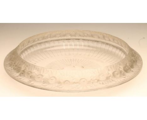 A LALIQUE CLEAR GLASS DISH, the shallow bowl moulded with the "Marguerite" pattern over a line moulded base, stencilled "R. L