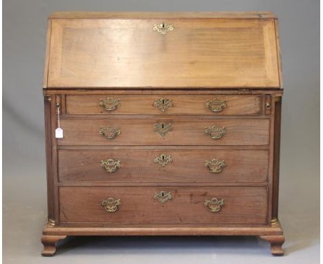 A GEORGIAN MAHOGANY BUREAU, c.1780, the fall front enclosing a stepped serpentine interior with drawers and pigeon holes cent