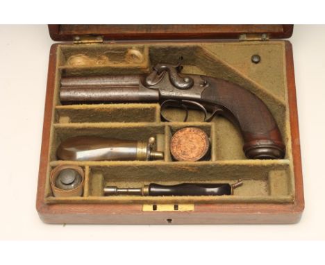 A DOUBLE BARRELLED OVER & UNDER PERCUSSION PISTOL by W. Jackson, London, with 3 3/8" barrels, twin dolphin cocks, scroll engr