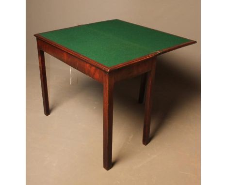 A GEORGIAN MAHOGANY CARD TABLE, late 18th century, of oblong form, the moulded edged top lined in green baize, plain frieze, 