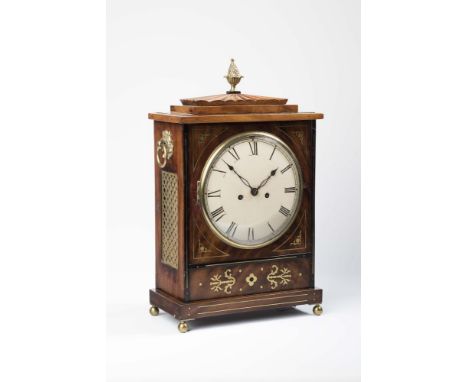 A REGENCY MAHOGANY AND BRASS INLAID BRACKET CLOCK, the double chain and fusee repeater strike on bell movement with leaf chas