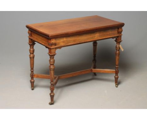 A VICTORIAN ROSEWOOD FOLDING CARD TABLE, probably by Marsh, Jones & Cribb, Leeds, the moulded edged swivel top opening to a m