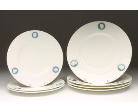A SET OF FOUR VICTORIAN MINTON CHINA DINNER PLATES, c.1861, of plain circular form, each with three pƒte-sur-pƒte classical h