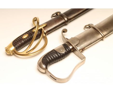 A GOOD QUALITY REPRODUCTION 1796 PATTERN CAVALRY SWORD, with 33" curved and fullered blade, stirrup hilt, ribbed leather grip