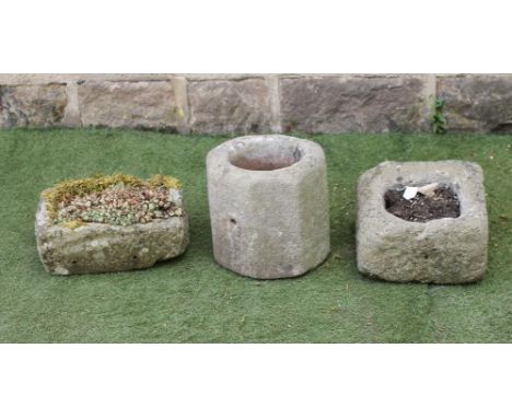 A SMALL SANDSTONE TROUGH of rough hewn oblong form, 14 1/2" x 11" x 5", together with another similar and an octagonal trough