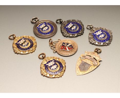 OF LOCAL AND MOTORING INTEREST -  "Keighley Motor Club", two matching blue and white enamelled  9ct gold medallions both awar