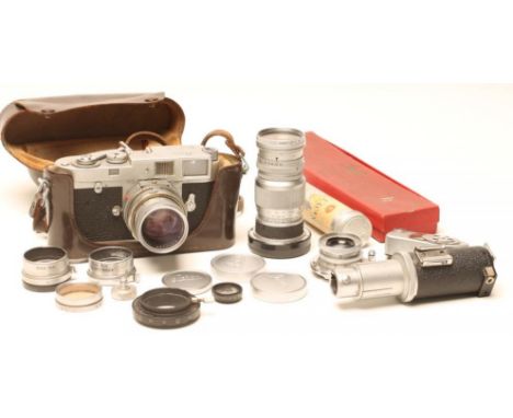 A LEICA WETZLAR M2 CAMERA with Summicron 1:2/50 lens, Summaron f=3,5cm 1:3,5, Wetzlar Elmar 1:4/90 lens, 2 Wetzlar filters, l