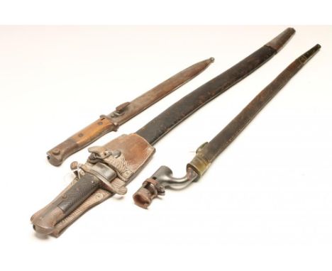 AN 1856 PATTERN BAYONET, with 23" yataghan blade, leather scabbard and leather frog, 28 1/4" long, together with a socket bay